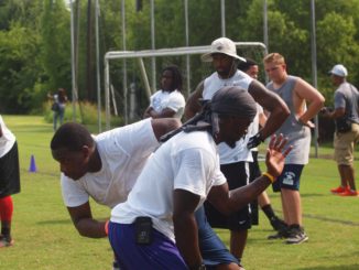 Dawan Landry (in hat)
