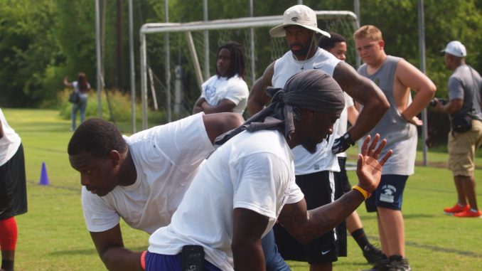 Dawan Landry (in hat)