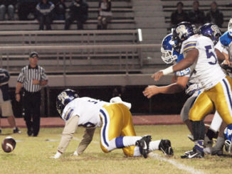 Hahnville attempts to recover a South Lafourche ball that was later ruled not a fumble.