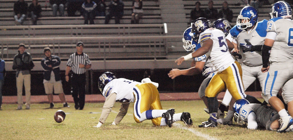 Hahnville attempts to recover a South Lafourche ball that was later ruled not a fumble.