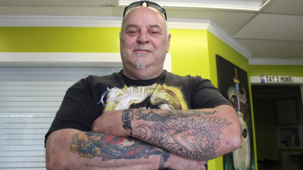 Paradis tattoo artist goes to battle against St. John