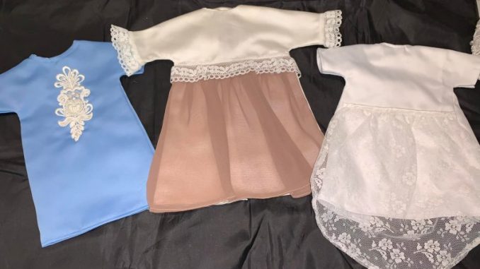 Womans company crafts baby burial gowns out of wedding dresses