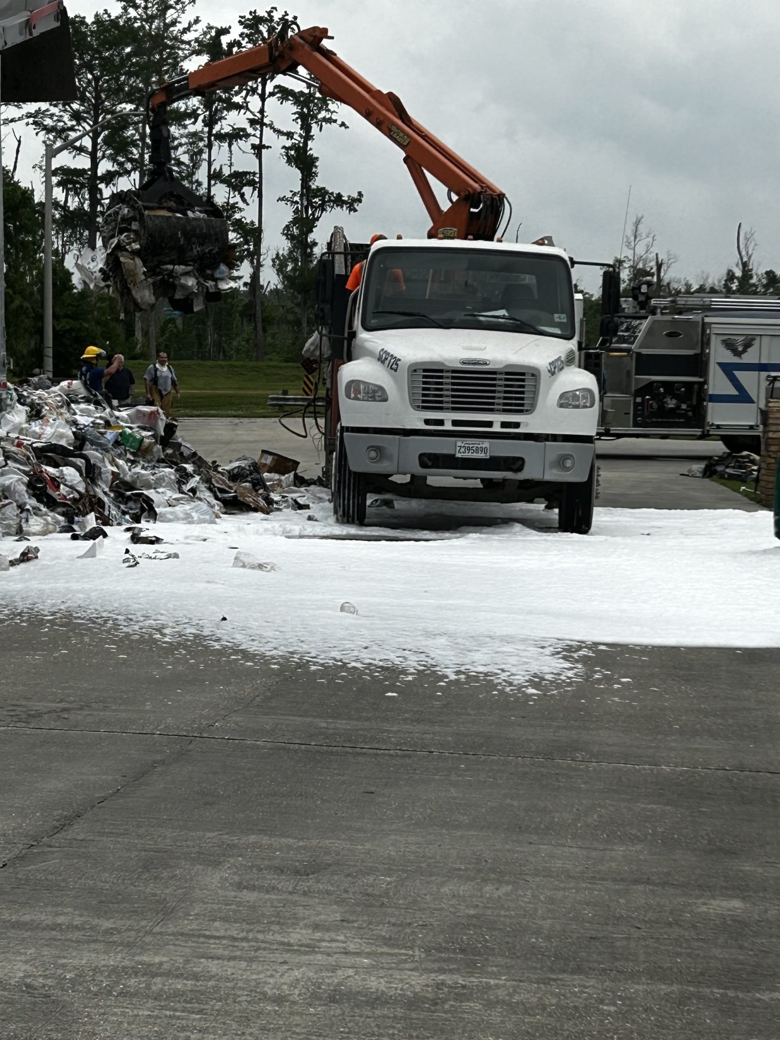 Garbage truck catches fire after flammable items thrown in trash