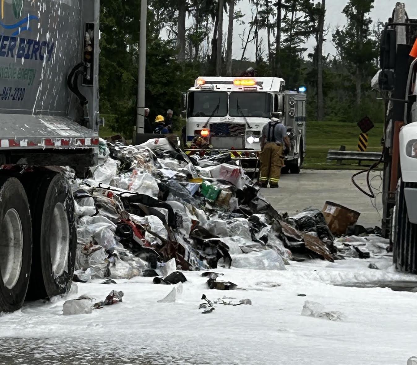 Garbage truck load catches fire again